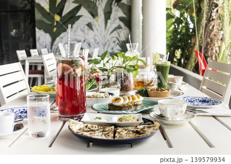 mixed western healthy food meal on restaurant table outdoors in singapore restaurant 139579934