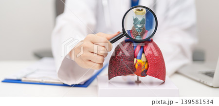 Doctor with Thyroid of Respiratory system anatomy for Diseases. Lung Cancer, Asthma, Chronic Obstructive Pulmonary or COPD, Bronchitis, Emphysema, Cystic Fibrosis, Bronchiectasis and Pneumonia Doctor with Thyroid of Respiratory system anatomy for Diseases. Lung Cancer, Asthma, Chronic Obstructive Pulmonary or COPD, Bronchitis, Emphysema, Cystic Fibrosis, Bronchiectasis and Pneumonia 139581534