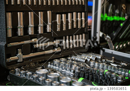 Tool set layout with assorted sockets and ratchets in a storage case showing organization Tool set layout with assorted sockets and ratchets in a storage case showing organization 139581651