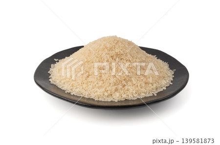 White parboiled rice grains. Dry uncooked ponni rice, small organic basmati White parboiled rice grains. Dry uncooked ponni rice, small organic basmati 139581873