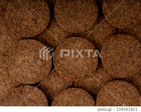 Party pumpernickel, whole grain rye bread rounds Party pumpernickel, whole grain rye bread rounds 139581921