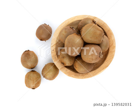 Kiwi fruits on table. Green kiwifruit pile Kiwi fruits on table. Green kiwifruit pile 139582031