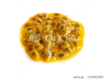 Passion fruit seeds isolated, passionfruit pulp puddle Passion fruit seeds isolated, passionfruit pulp puddle 139582093