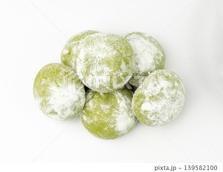 Matcha mochi rice cake, green tea daifuku, Japanese traditional dessert, round wagashi Matcha mochi rice cake, green tea daifuku, Japanese traditional dessert, round wagashi 139582100