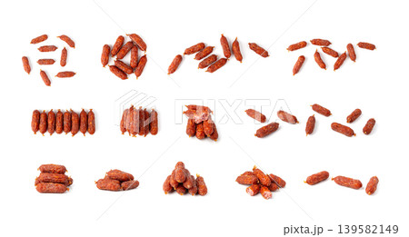 Mini Sausages Isolated, Dry Smoked Salami Sticks Mini Sausages Isolated, Dry Smoked Salami Sticks 139582149