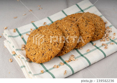 Whole and broken oatmeal cookies, cereal biscuits, fitness bakery 139582236