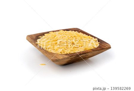 Raw orzo pasta, risoni or kritharaki pile Raw orzo pasta, risoni or kritharaki pile 139582269