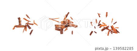 Broken ceylon cinnamon isolated, cinnamomum verum bark pieces Broken ceylon cinnamon isolated, cinnamomum verum bark pieces 139582285