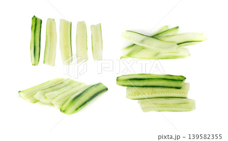 Cucumber cut isolated, cucumber slices, green vegetable cuts for salad isolated Cucumber cut isolated, cucumber slices, green vegetable cuts for salad isolated 139582355
