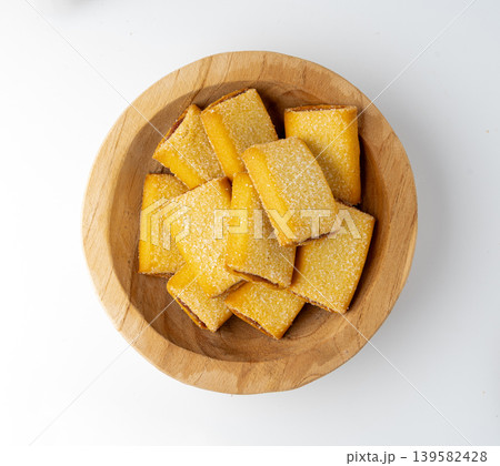 Fig roll bar, square sugar cookies with fruit filling isolated Fig roll bar, square sugar cookies with fruit filling isolated 139582428