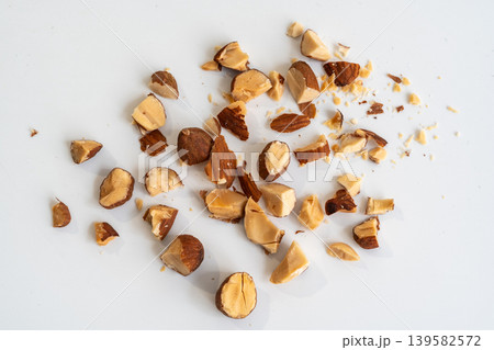 Crushed almonds macro texture on white Crushed almonds macro texture on white 139582572