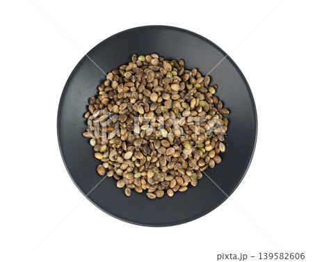 Hemp seeds, cannabis grains, marijuana kernels, oil hempseeds pile Hemp seeds, cannabis grains, marijuana kernels, oil hempseeds pile 139582606