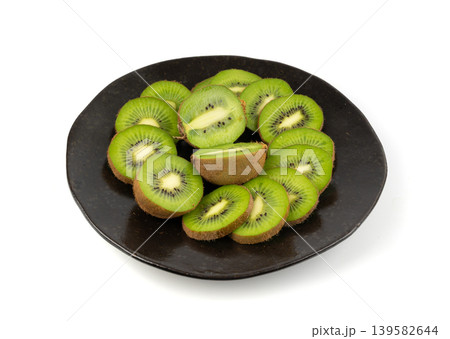 Kiwi fruit isolated. Green kiwifruit slice, kivi cut Kiwi fruit isolated. Green kiwifruit slice, kivi cut 139582644