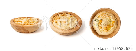 Hummus in bowl, houmous dip, chickpea humus tahini sauce, middle eastern spread Hummus in bowl, houmous dip, chickpea humus tahini sauce, middle eastern spread 139582676