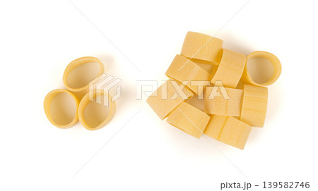 Raw Calamarata Big Pasta Isolated, Homemade Dry Macaroni, Italian Raw Round Noodle Raw Calamarata Big Pasta Isolated, Homemade Dry Macaroni, Italian Raw Round Noodle 139582746