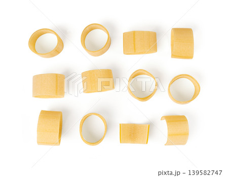 Raw Calamarata Big Pasta Isolated, Homemade Dry Macaroni, Italian Raw Round Noodle 139582747
