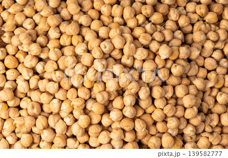Chickpea, chick pea pile, dry Cicer arietinum fruits, raw Bengal gram legume, garbanzo beans Chickpea, chick pea pile, dry Cicer arietinum fruits, raw Bengal gram legume, garbanzo beans 139582777