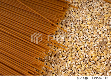 Raw Brown Pasta, Wholegrain Spaghetti Raw Brown Pasta, Wholegrain Spaghetti 139582816