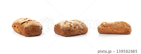 Whole wheat brown bread isolated, fitness pumpkin carrot buns with seeds, cereal bread Whole wheat brown bread isolated, fitness pumpkin carrot buns with seeds, cereal bread 139582865