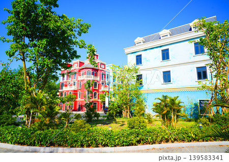 Buildings with colorful facades, balconies in european bright sunny day. Facade buildings 139583341