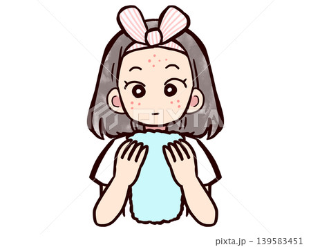 洗顔をしてタオルで顔を拭くニキビのある女の子 139583451