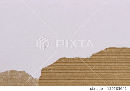 White and brown cardboard sheet abstract background, texture of recycle paper box in old vintage pattern with ripped edges. White and brown cardboard sheet abstract background, texture of recycle paper box in old vintage pattern with ripped edges. 139583641