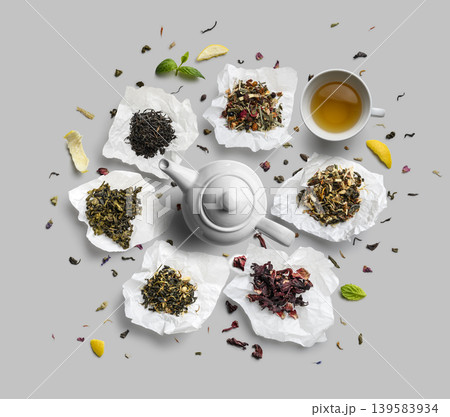 Large assortment of tea on a grey background. The view from the top Large assortment of tea on a grey background. The view from the top 139583934