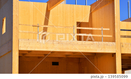 Laminate wood floors and supports of a mass timber multi story green, sustainable office building construction project Laminate wood floors and supports of a mass timber multi story green, sustainable office building construction project 139585099