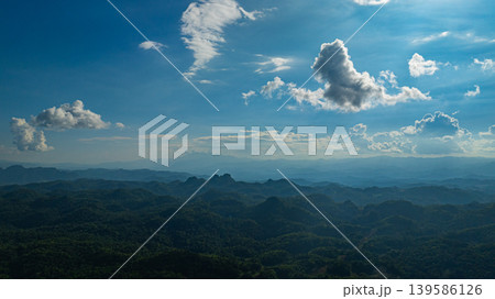 Aerial view of clouds moving above the mountain range 139586126