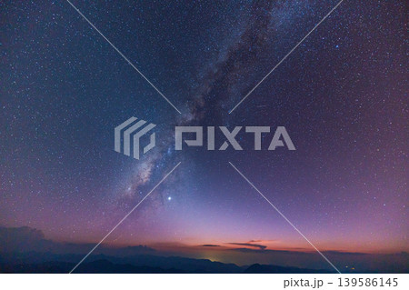 Time lapse The Milky Way above mountain is beautifully clustered. Time lapse The Milky Way above mountain is beautifully clustered. 139586145