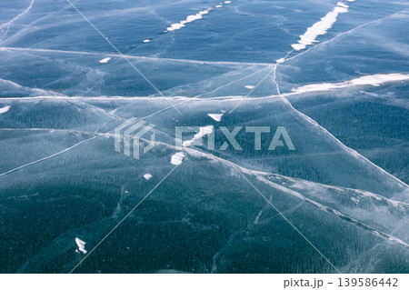 Aerial winter view of cracked ice patterns on Lake Baikal, Siberia, Russia Aerial winter view of cracked ice patterns on Lake Baikal, Siberia, Russia 139586442