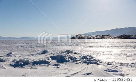 Frozen Lake Baikal landscape in Maloye More strait with ice hummocks Frozen Lake Baikal landscape in Maloye More strait with ice hummocks 139586455