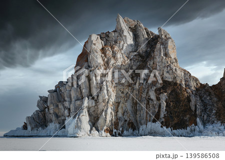 Shaman Rock on frozen Lake Baikal near Khuzhir village, Olkhon Island, Russia 139586508
