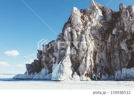 Shaman Rock Shamanka on frozen Lake Baikal in winter, Olkhon Island 139586512