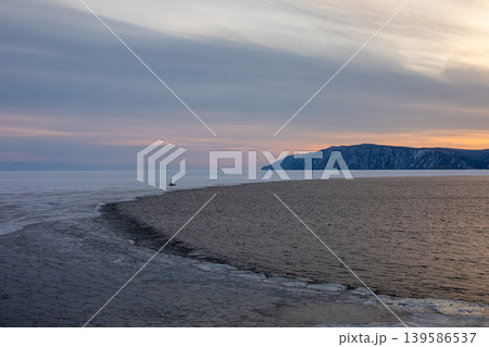 Winter sunset at the Angara River and Lake Baikal confluence, Listvyanka 139586537