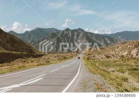 Scenic Chuysky Trakt highway through Altai Mountains with open road view Scenic Chuysky Trakt highway through Altai Mountains with open road view 139586600