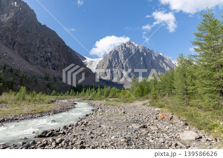 Mountain river and rocky valley landscape in Aktru Valley, Altai Mountains Mountain river and rocky valley landscape in Aktru Valley, Altai Mountains 139586626