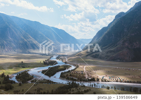 Akkurum tract mountain valley with winding river and summer camp in Altai Akkurum tract mountain valley with winding river and summer camp in Altai 139586649