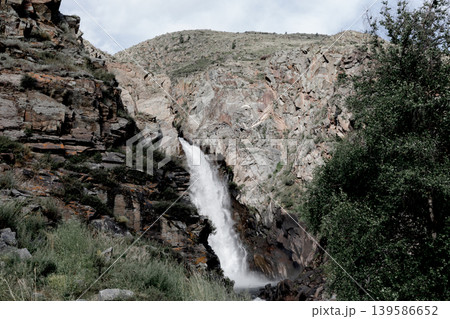 Kurkure waterfall in rocky gorge of Chulyshman Valley, Altai Mountains Kurkure waterfall in rocky gorge of Chulyshman Valley, Altai Mountains 139586652