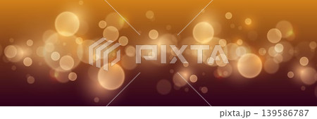 Warm golden light bokeh background creating a shimmering abstract festive effect 139586787