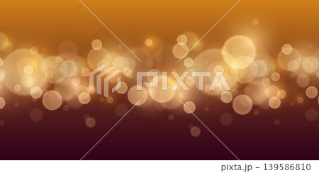 Golden bokeh lights shimmering on a dark gradient background, creating a festive glow 139586810