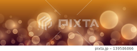 Warm golden brown bokeh blurred background creating festive abstract light effect 139586866