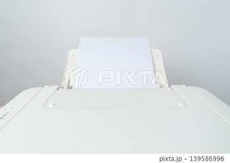 White Printer With Blank Paper Feeding Into Office Copier Minimal Desk Printing Concept wide angle Photo White Printer With Blank Paper Feeding Into Office Copier Minimal Desk Printing Concept wide angle Photo 139586996