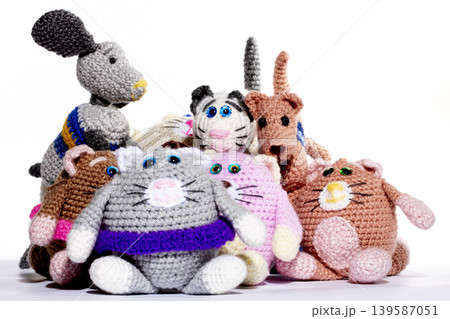 Various knitted woolen toys on a white background Various knitted woolen toys on a white background 139587051