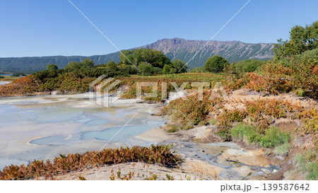 Uzon volcano caldera geothermal mud pools and tundra landscape in Kamchatka Uzon volcano caldera geothermal mud pools and tundra landscape in Kamchatka 139587642