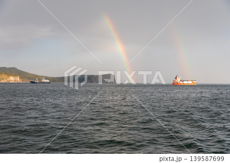 Cargo ships under double rainbow in Avacha Bay near Petropavlovsk-Kamchatsky 139587699