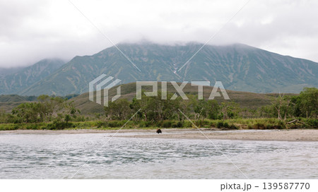 Kuril Lake landscape with volcanic mountains and wild shoreline in Kamchatka 139587770