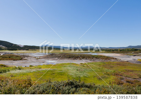 Uzon Volcano caldera landscape with geothermal fields and tundra, Kamchatka Uzon Volcano caldera landscape with geothermal fields and tundra, Kamchatka 139587838