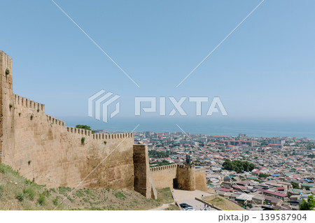 Naryn-Kala fortress walls overlooking Derbent city and Caspian Sea coastline Naryn-Kala fortress walls overlooking Derbent city and Caspian Sea coastline 139587904