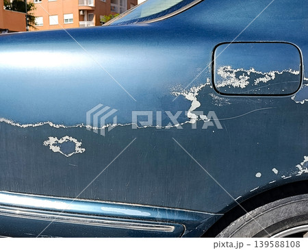 Car Body with Faded and Peeling Blue Paint Car Body with Faded and Peeling Blue Paint 139588108